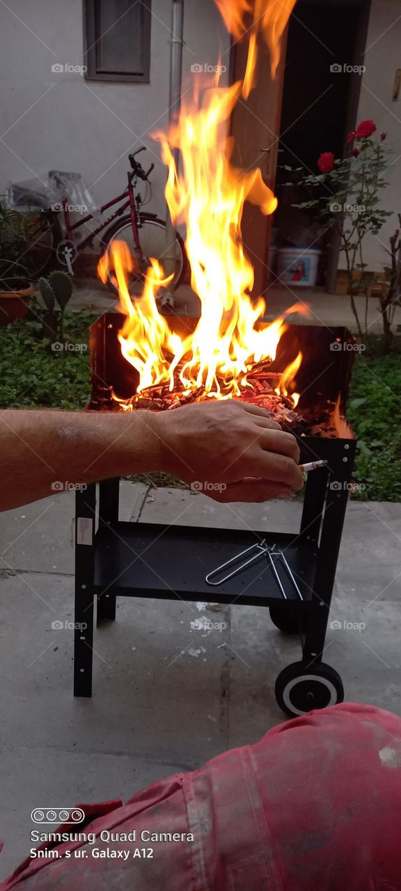 starting the fire for a barbecue