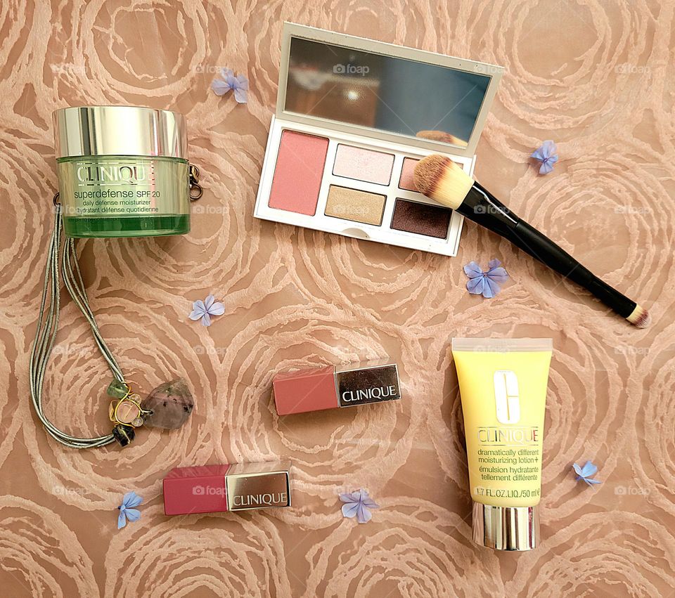 flatlay makeup essentials from clinique