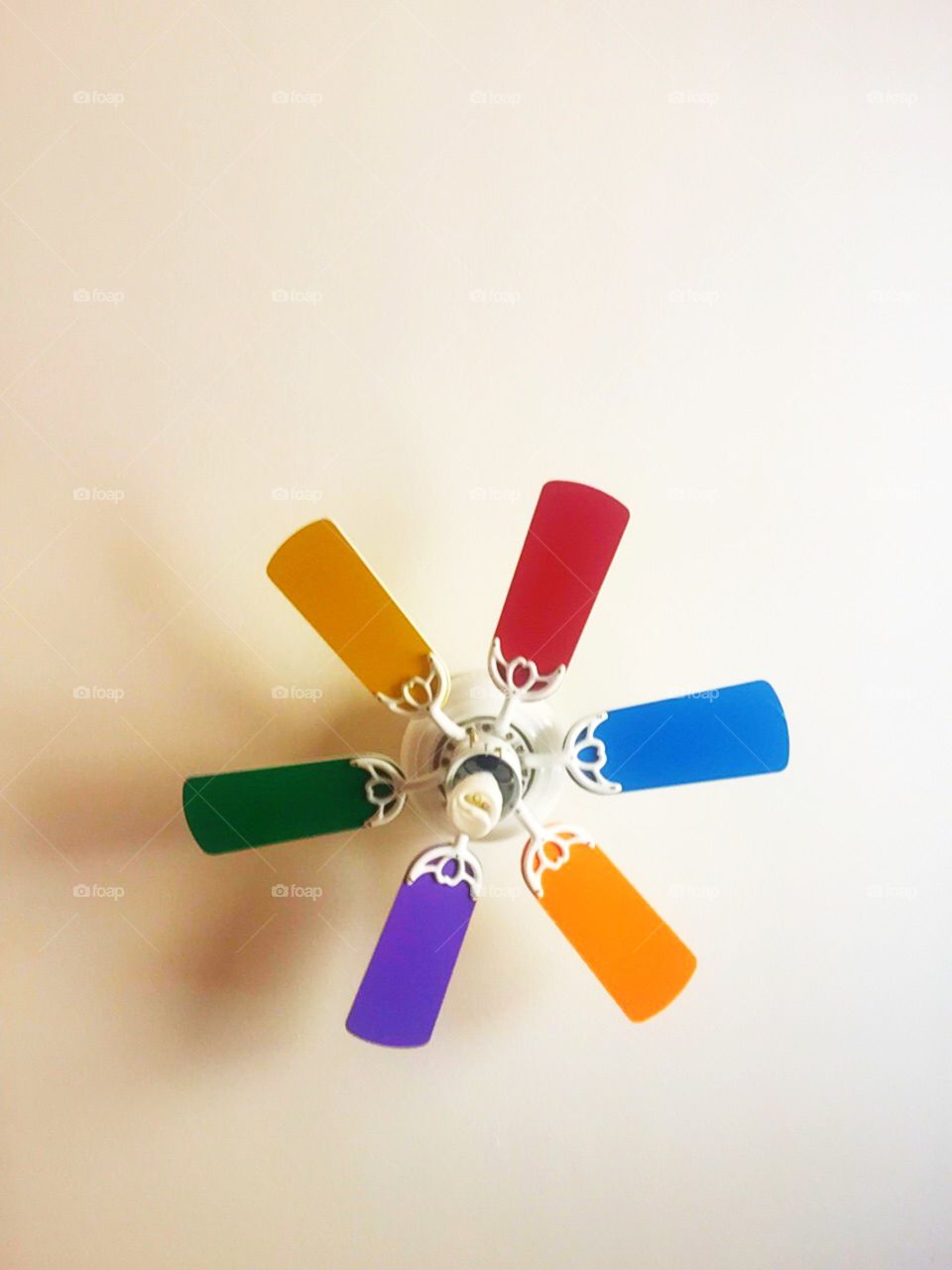 Colored fan on a ceiling 