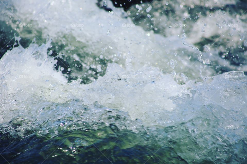 Rushing waters at Itanda Falls in Uganda.