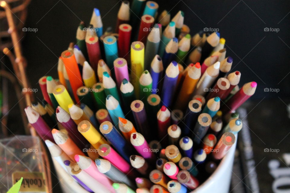 High angle view of coloured pencils