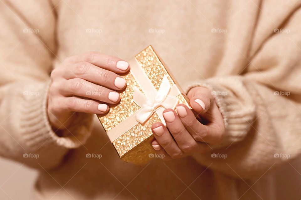 person holding a gift box