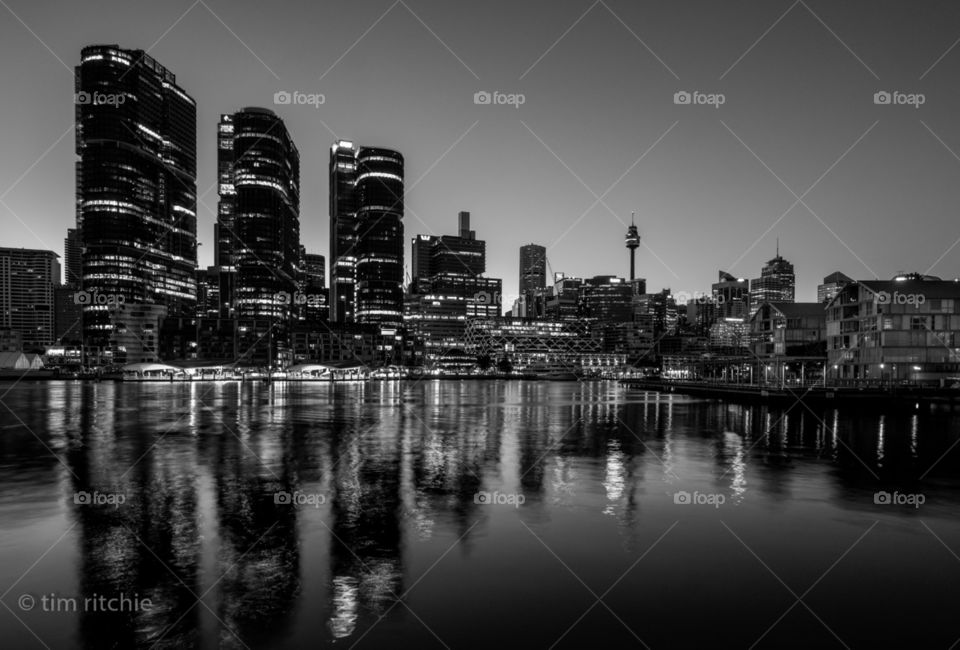 On a steely morning, Sydney rises from the dark to show her dark heart. Darling Harbour, Barangaroo southern zone and the city behind starting to wake the wheels of capital
