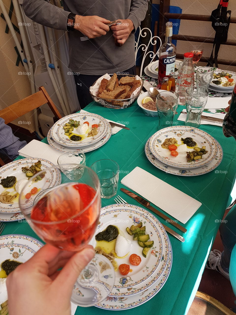 Happy toast with Campari and mixed appetizer