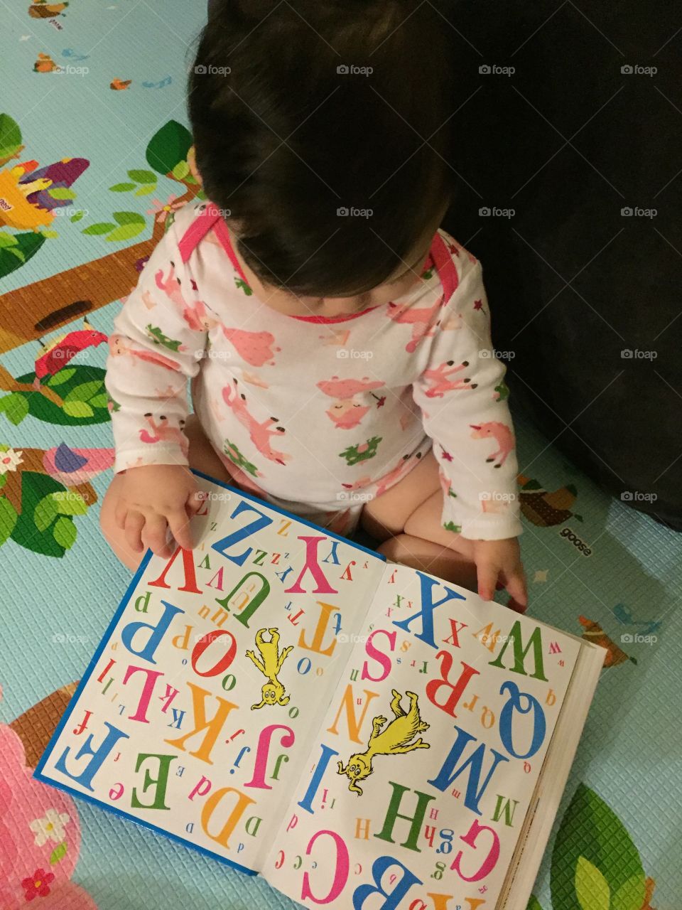 Learning her alphabet 
