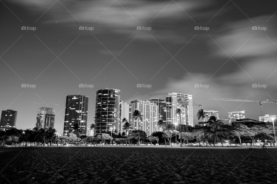 Black and white shot of a city at night