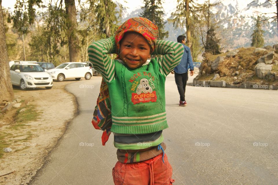 A kid with a gorgeous smile.