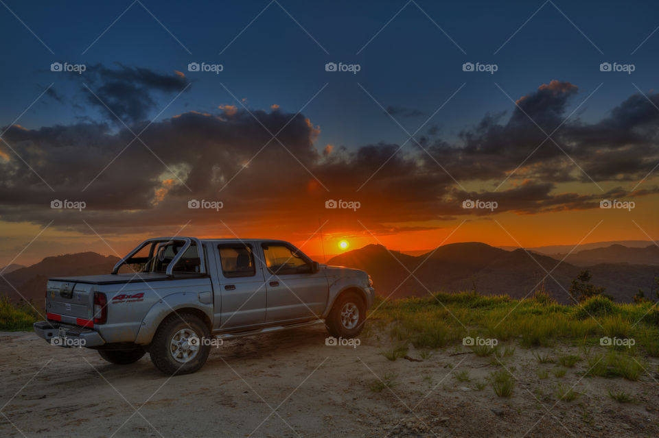 This is your road trip - watching the sunset at the top of the mountain.