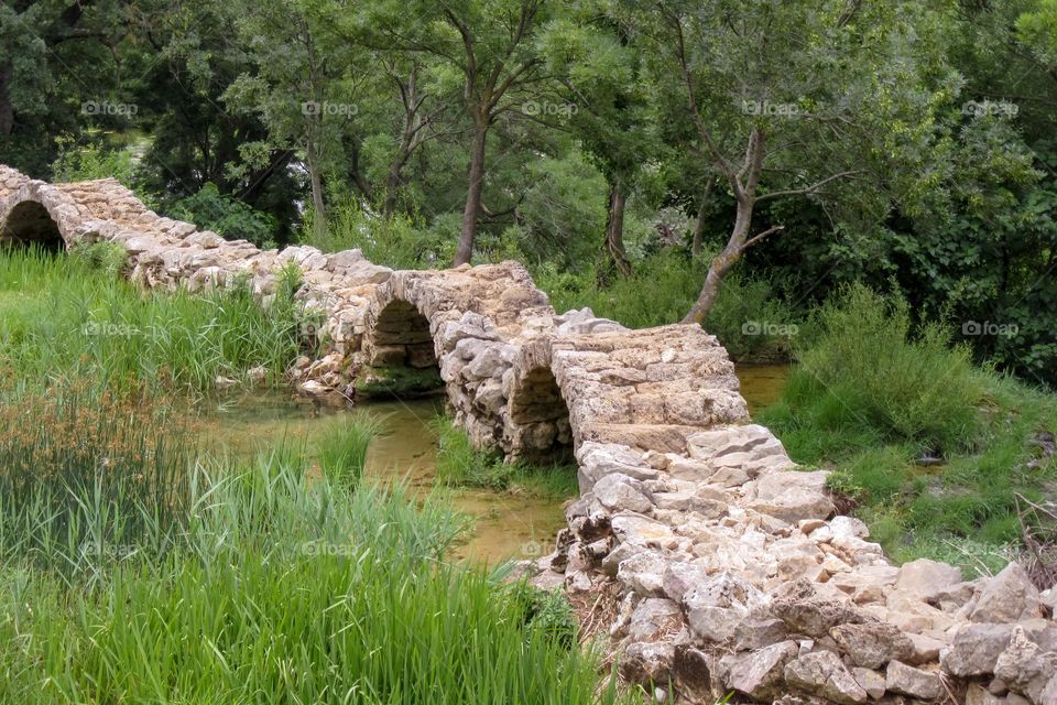 Detail of stone bridge built 200 years ago by young man that loved a girl on other side of river