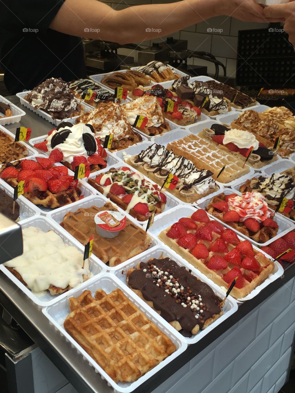 A waffle stand with delicious dessert waffles in Brussels 