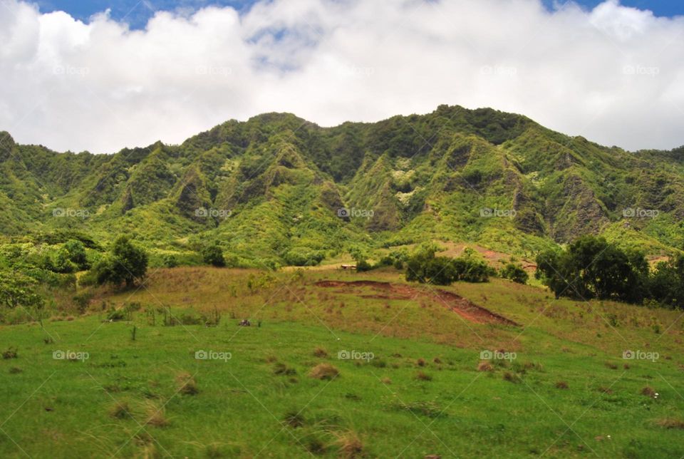 Mountains  reaching sky photo taken from a low angle view 