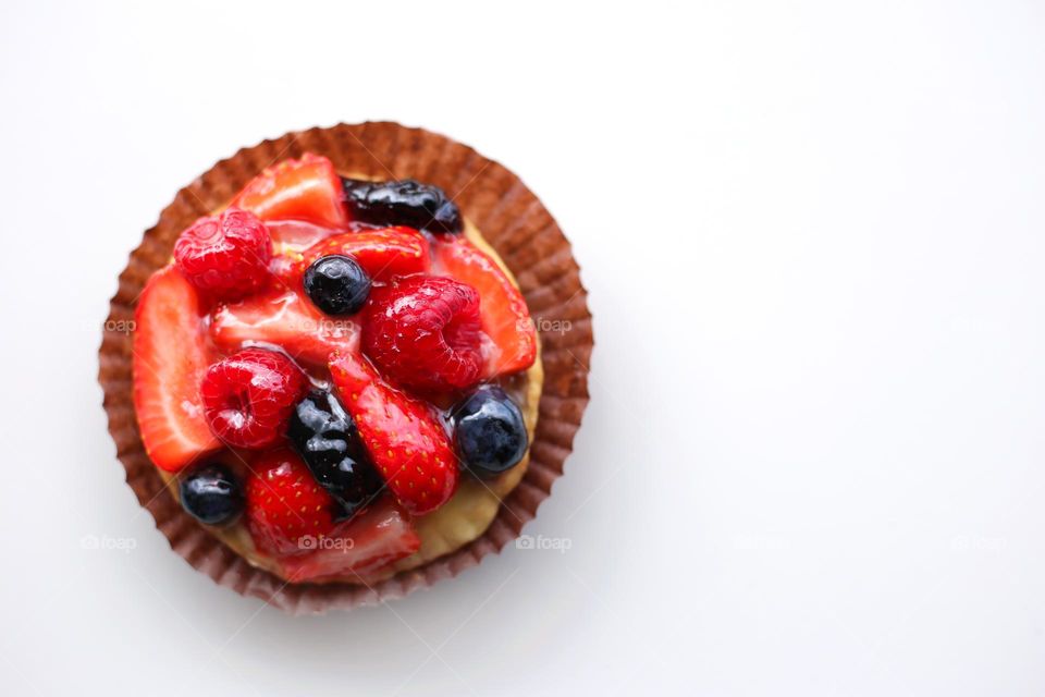 Delicious pastry with berries, top view 