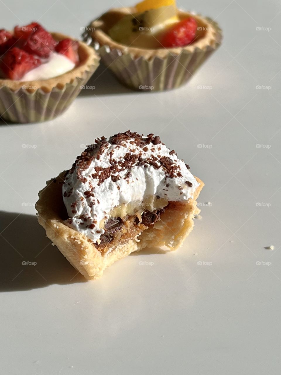 Assorted homebaked Fruit tarts and Nutella chocolate nut butter tarts 