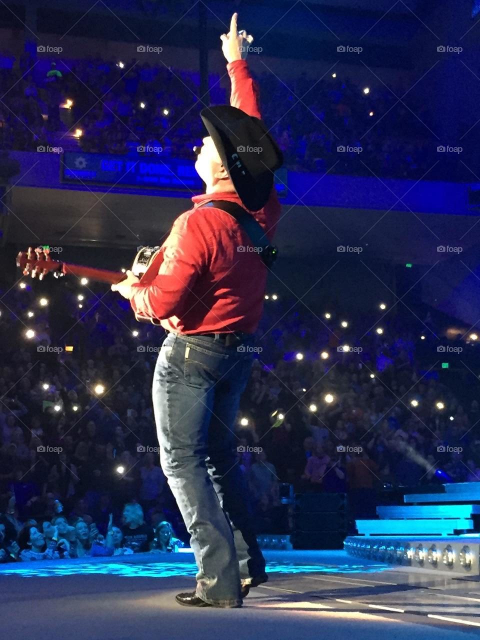 This is a photo of Garth Brooks taken from front row seats at his concert.