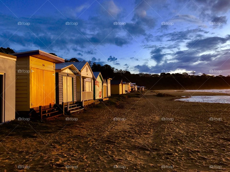 The evening sunset on the bathing boxes at Mount Martha Victoria Australia 