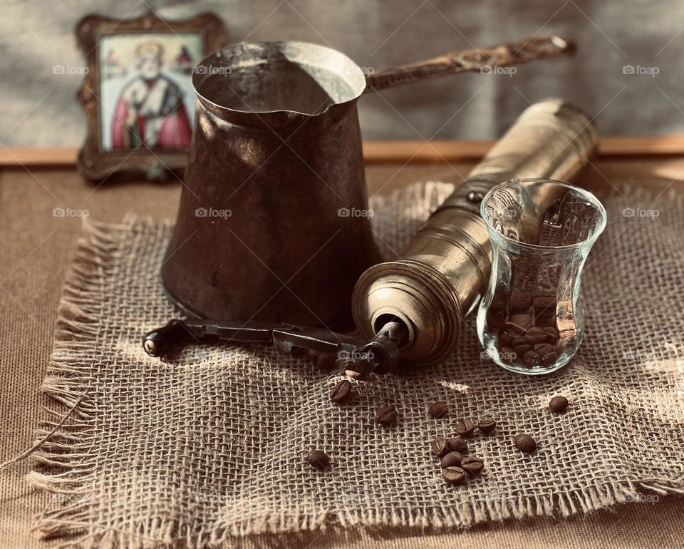 Old coffee grinder and copper pot, coffee beans, icon