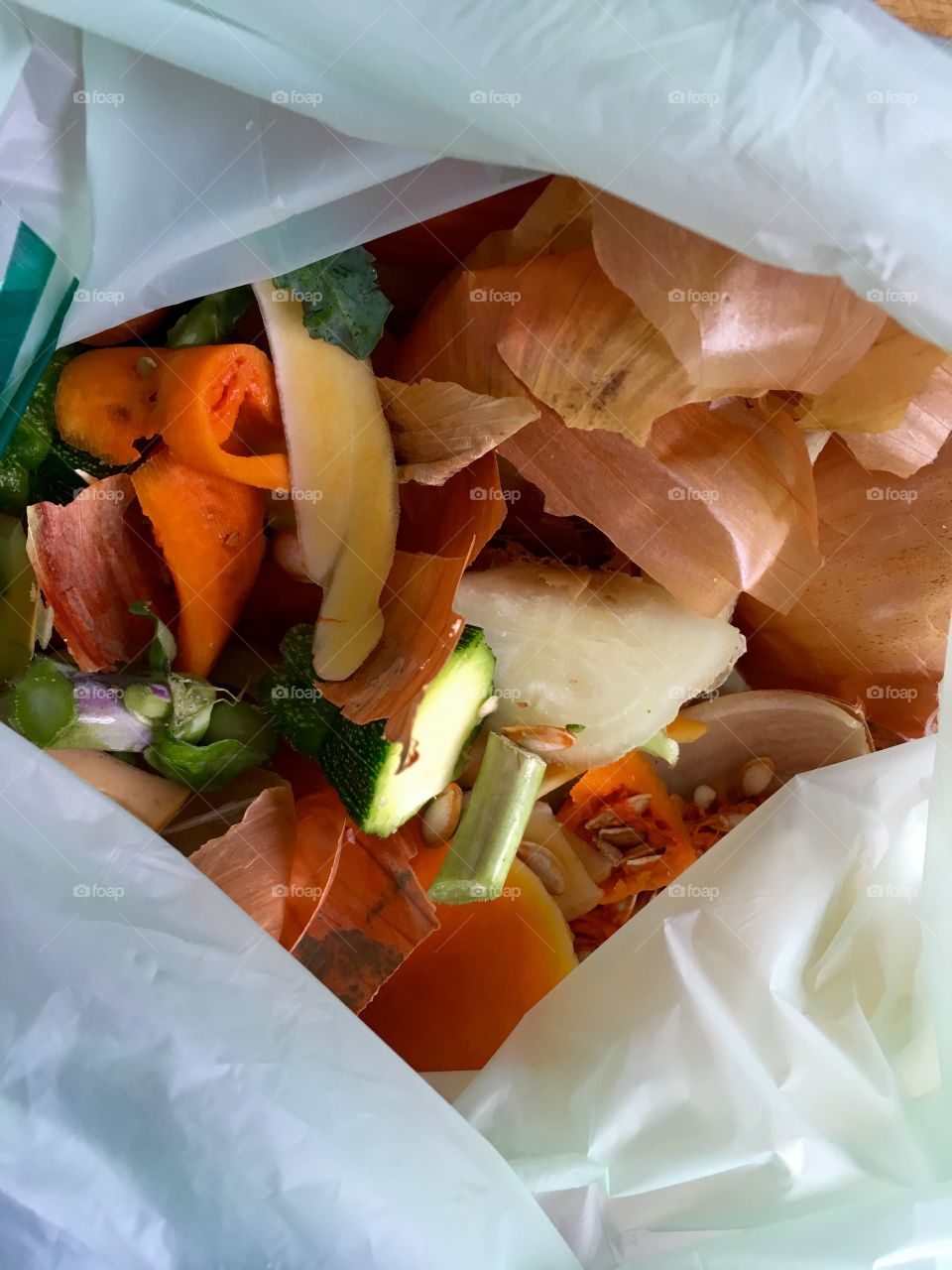 Food off cuts in food recycling bag after preparing dinner