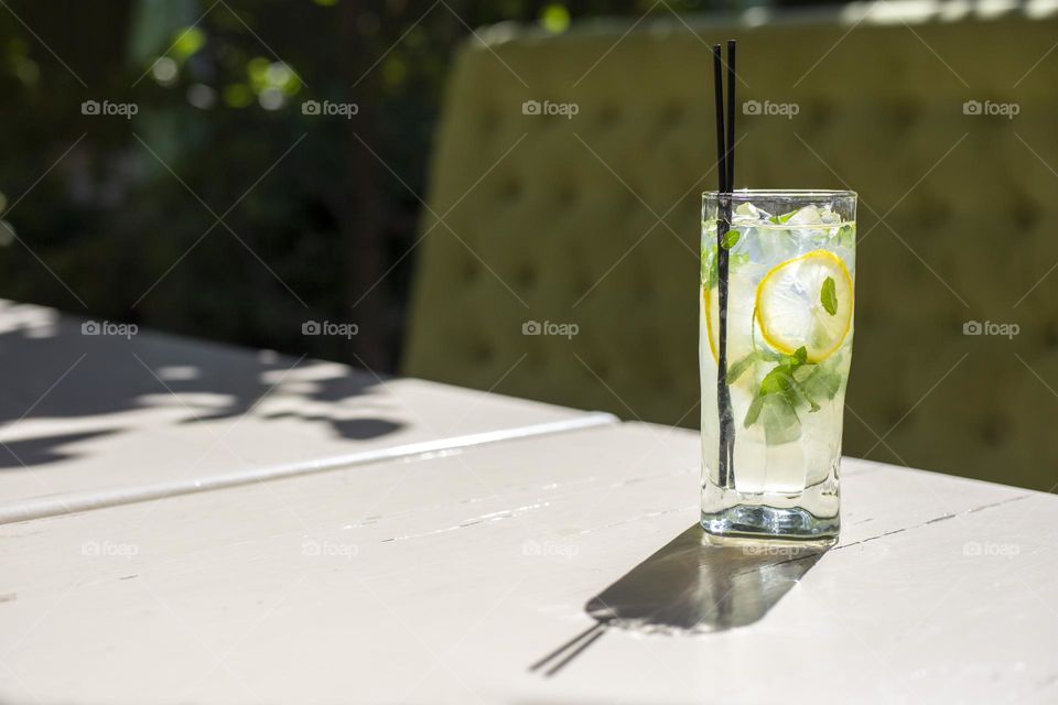 Glass of lemonade on the table 