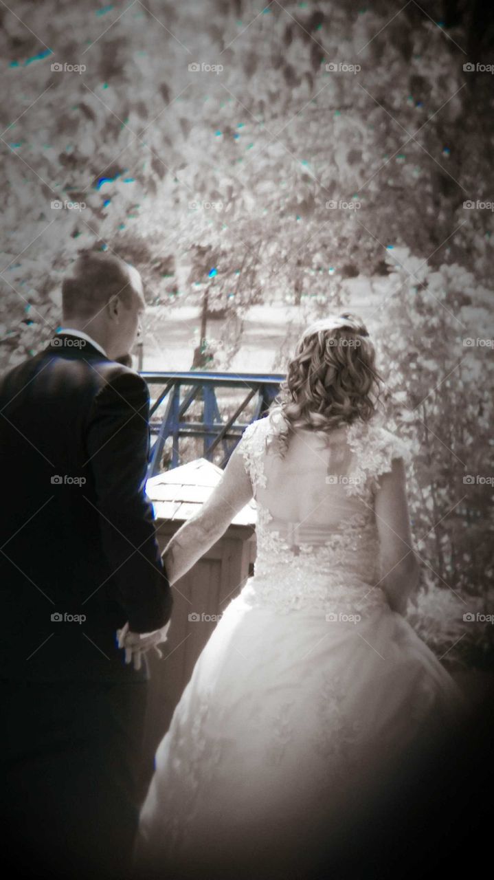 The fried in the groom  Walking after the ceremony