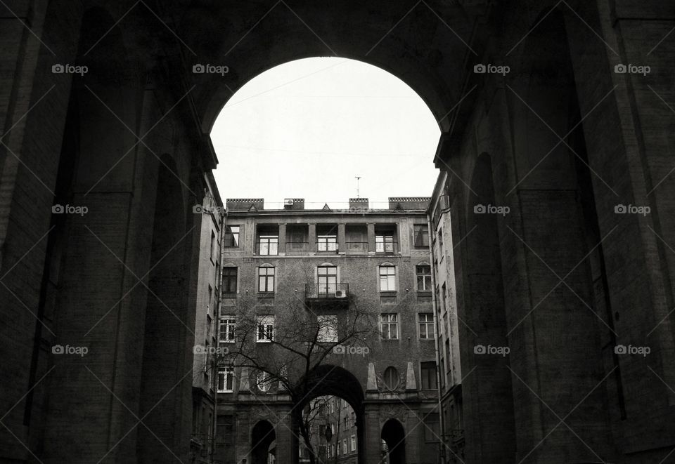 Tunnel with a view on the house in Saint-Petersburg, Russia