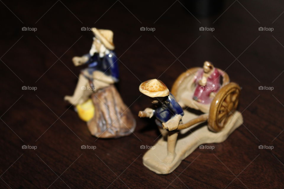 Decorations with figurines. Asian workers