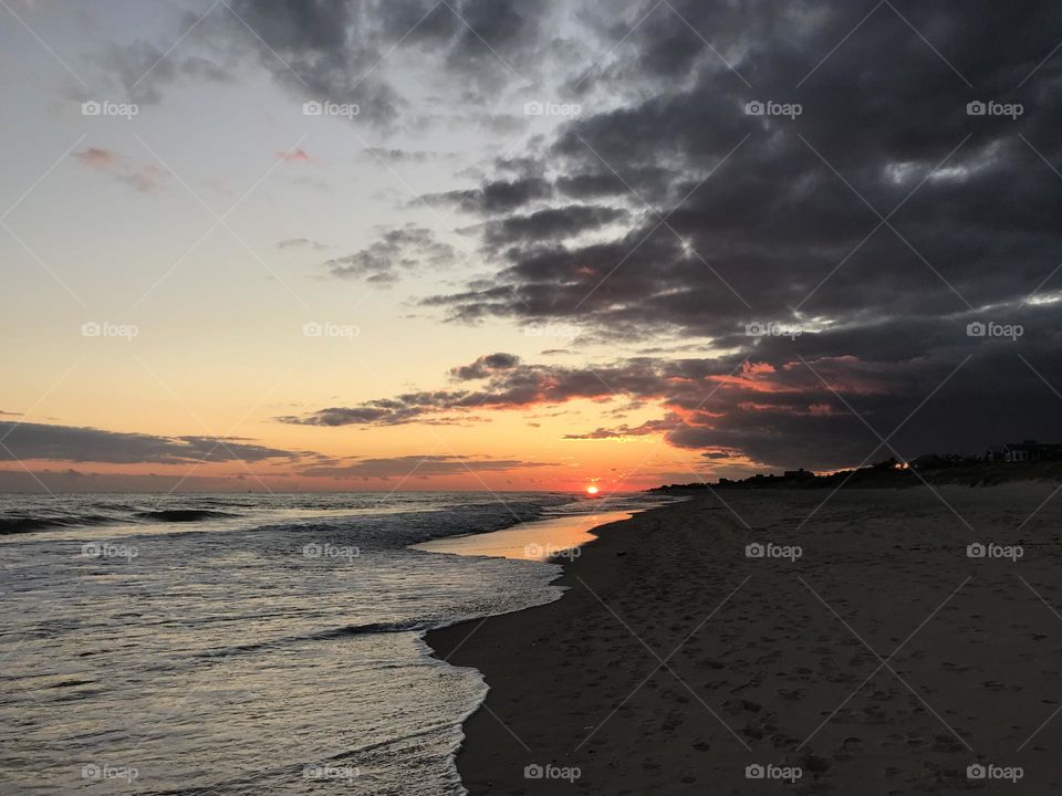 Two-tone orange and gray beach sunset