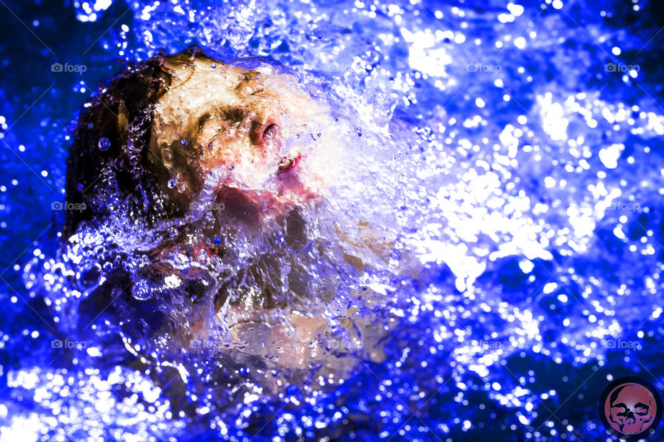 Summer poolside . My son was jumping into a swimming pool in Grand Rapids, Michigan. 