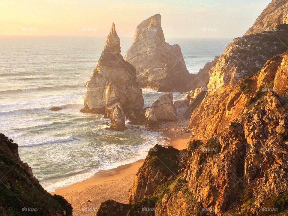 Golden sunset on the Ursa beach, Portugal