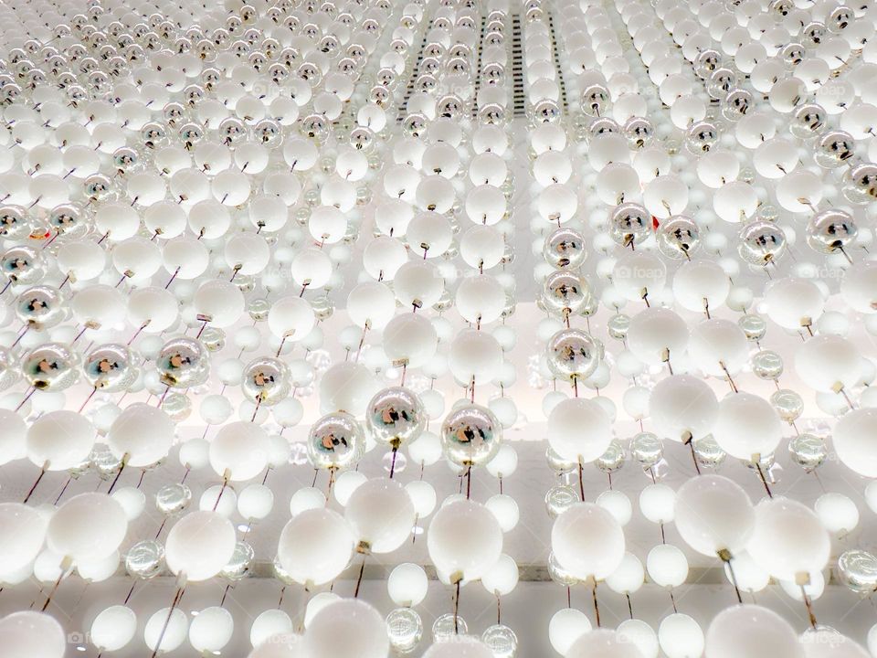 Curtain of lighted white beads