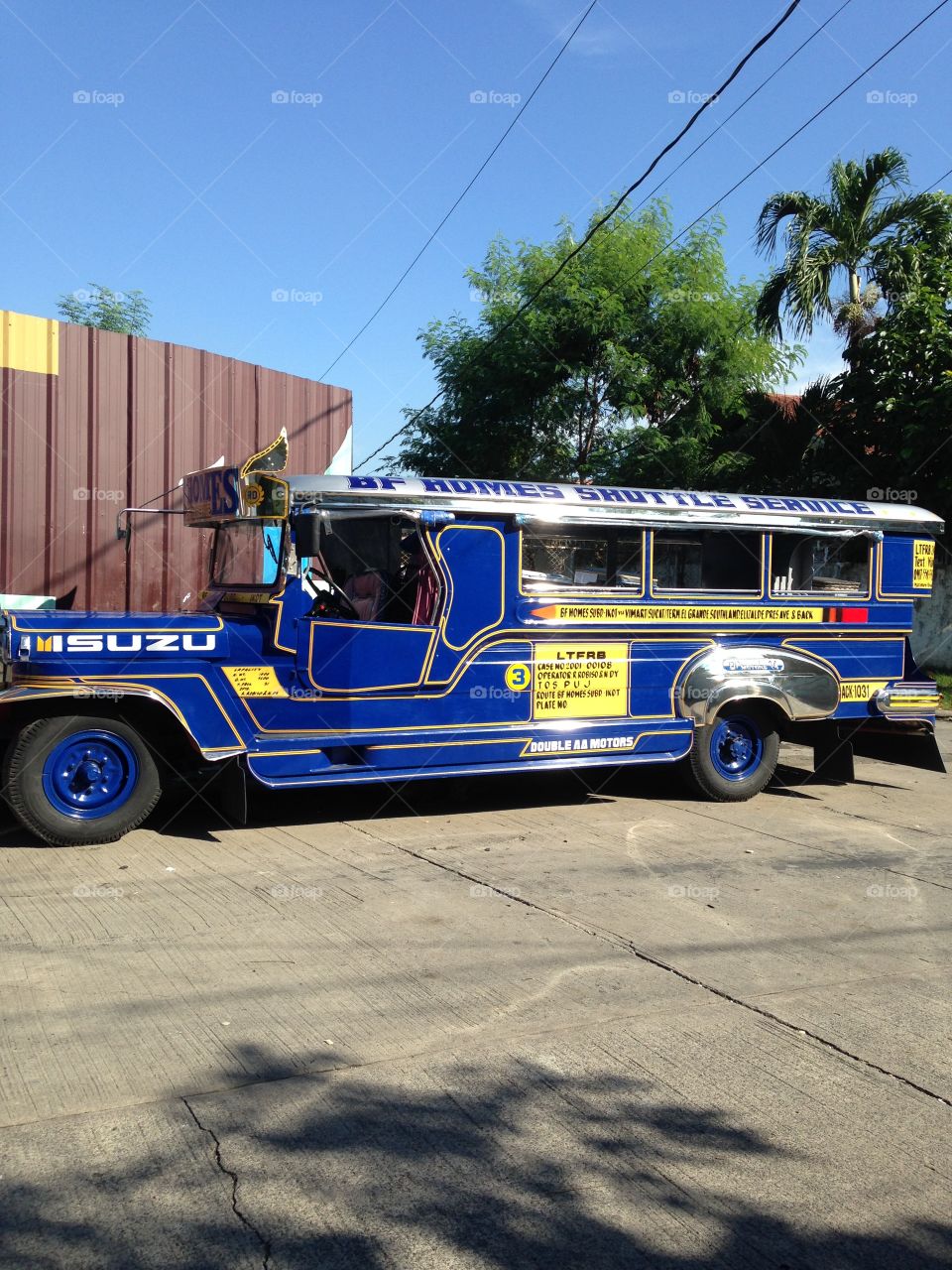 this is a jeepney a means of transport you can find only in the Philippines. It has long history having started right after world war two when the military jeeps were converted into jeepneys. they were only half the length of the present designs