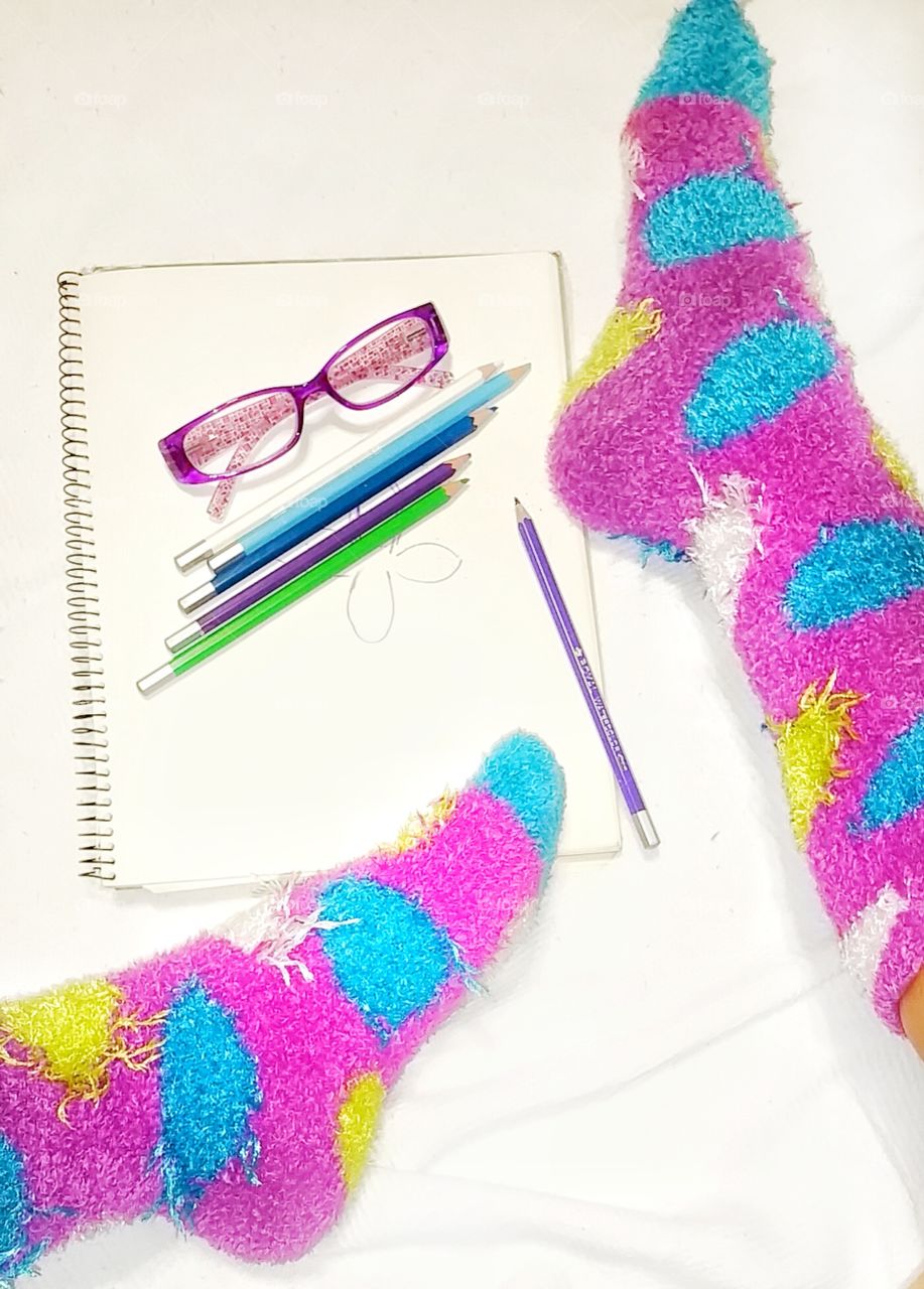 bright color socks with art supplies