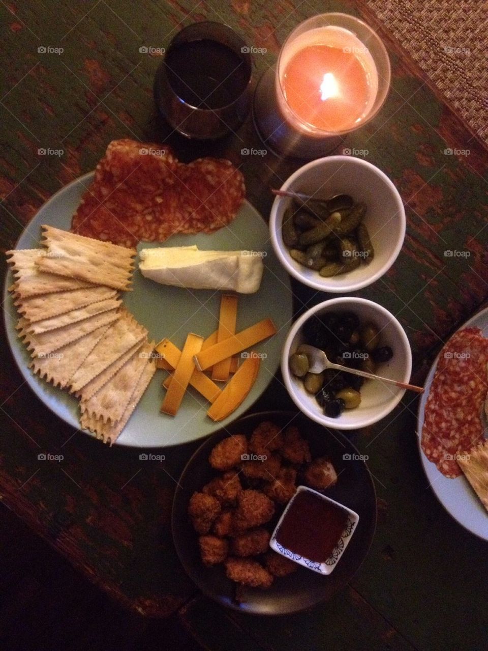 Meat and cheese plate with wine