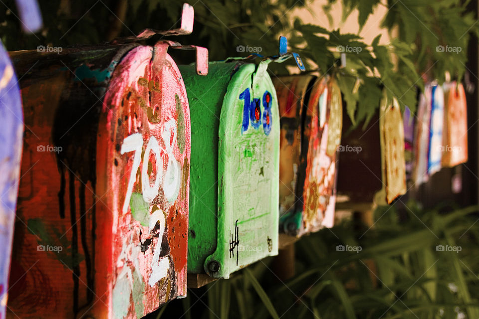 Painted mailboxes in a row