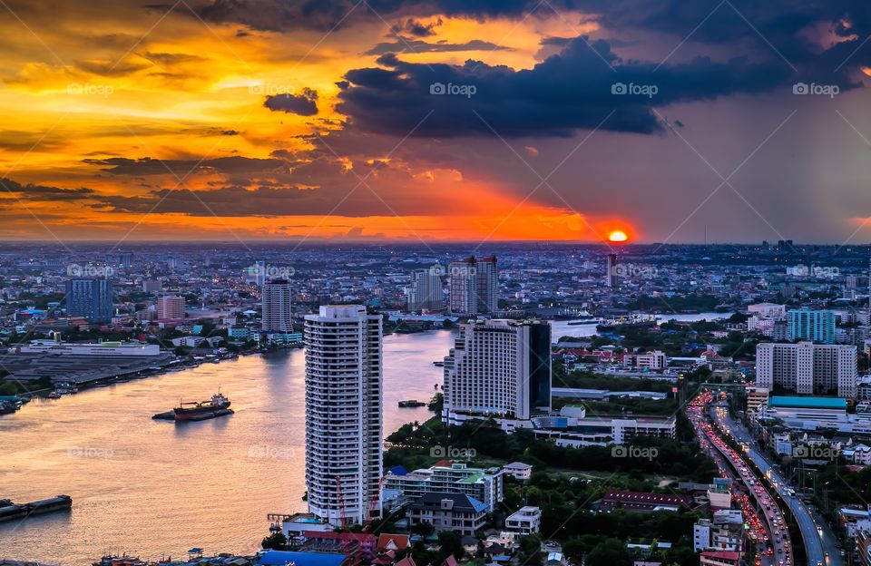 High angle view of city during sunset