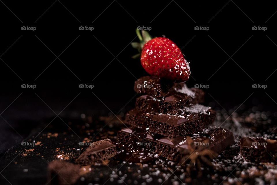 Chocolate pyramid with strawberry