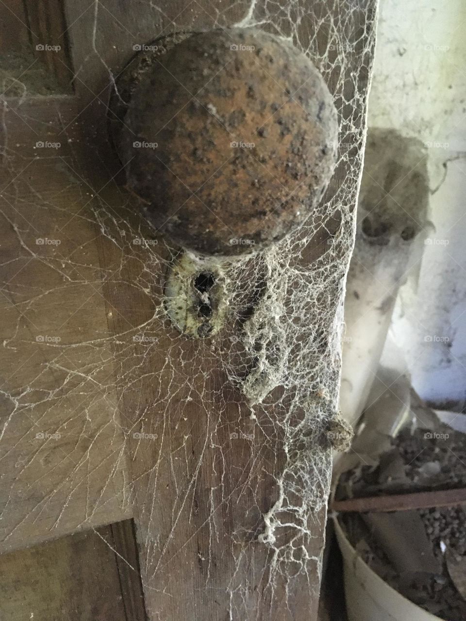 Cobweb door knob and keyhole 