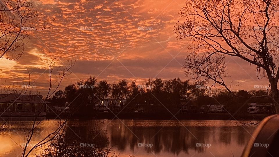 Boom here it goes the clouds are showing stress the colors are blowing up into little puffy orange bites of goodness. 