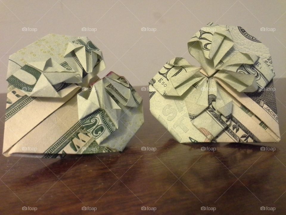 two cute little hearts made out of $20 bills
