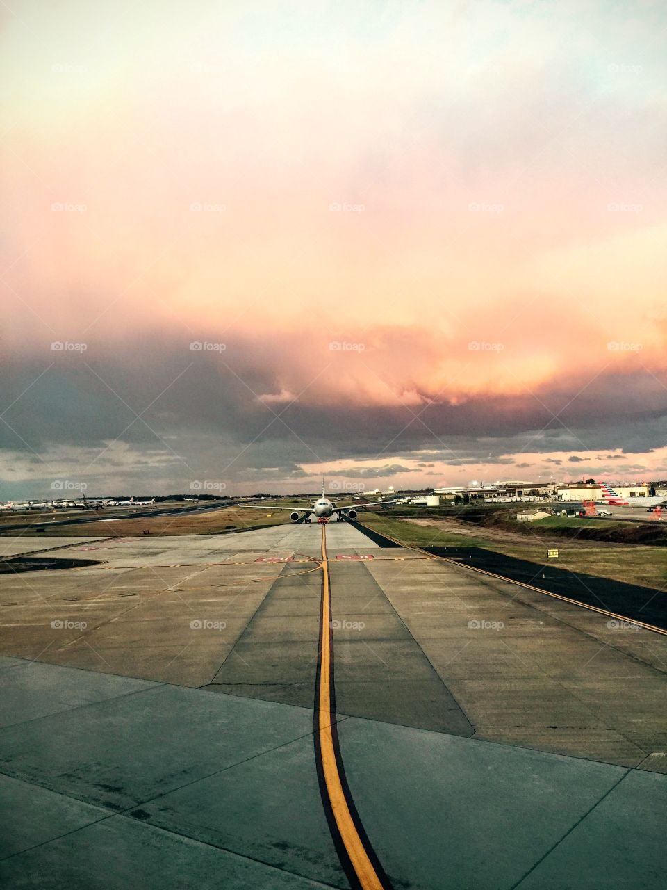 Charlotte airport runway sunset 