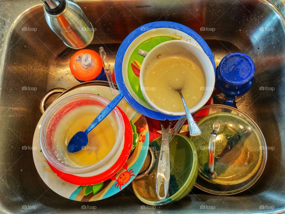 Dirty dishes in the kitchen sink