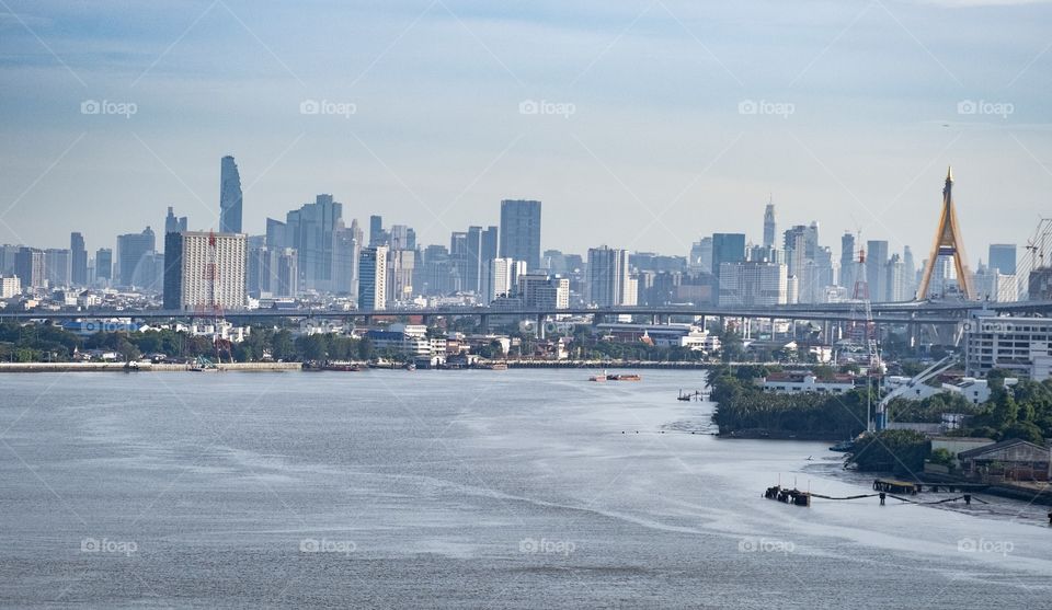 The capital of Thailand , Bangkok city scape view from Chao Phraya River 