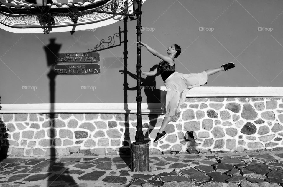 Ballet Art, Ballerina jumping on the street, Black and White