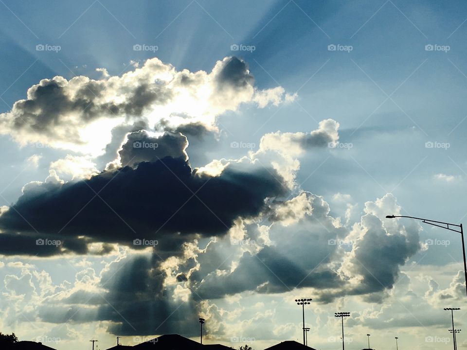 Sun rays through clouds 