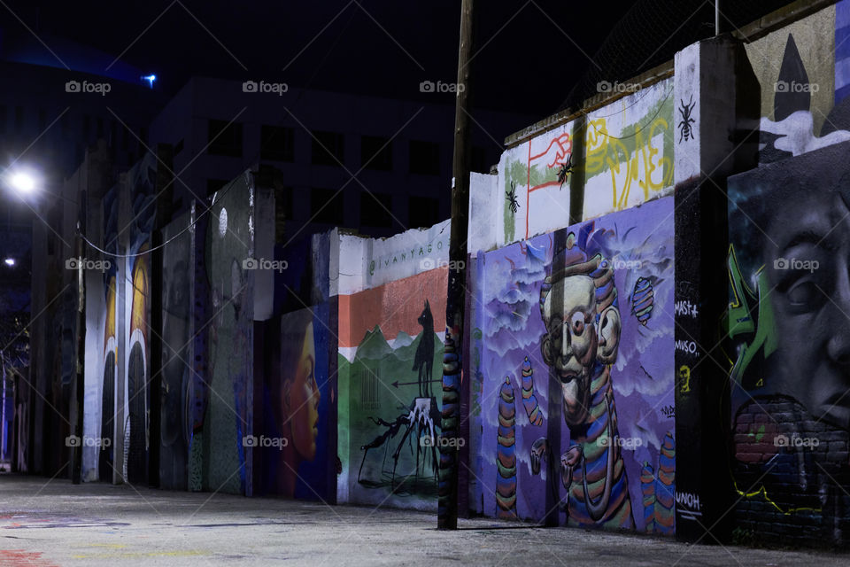 Night lights over a Graffiti Wall