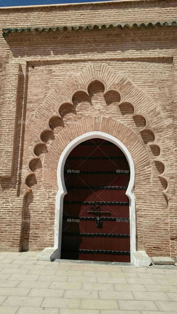 Ancient door of Kotoubia mosque at marrakech city in Morocco