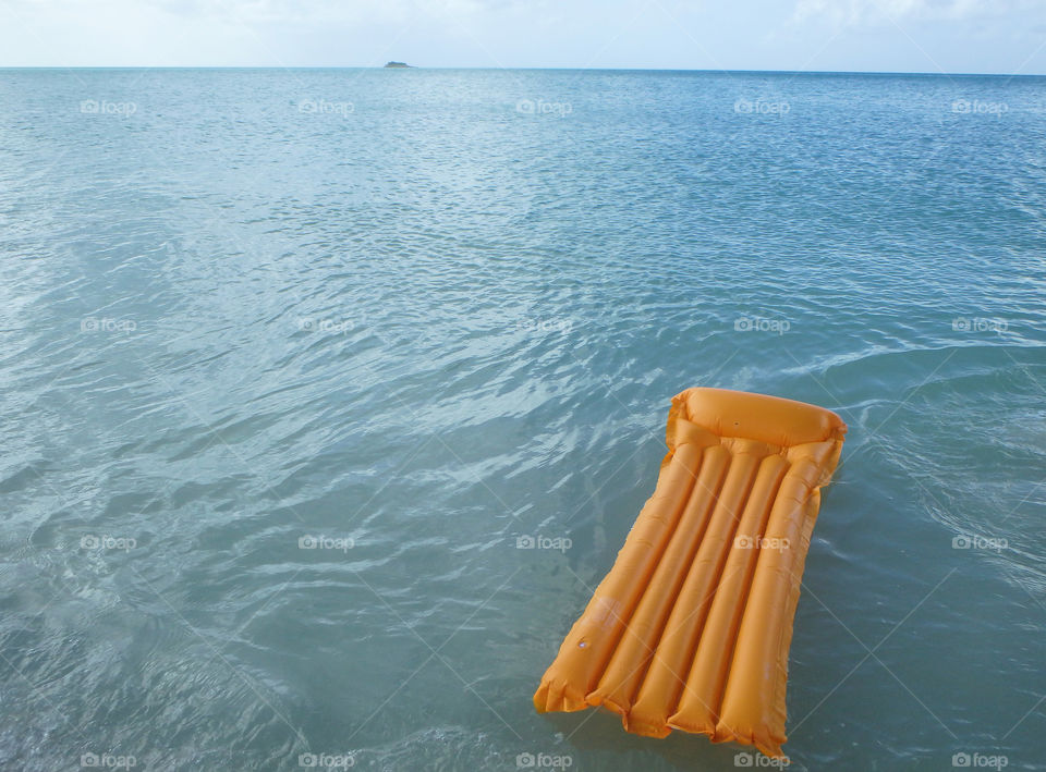 Yellow Raft on Blue Caribbean Water