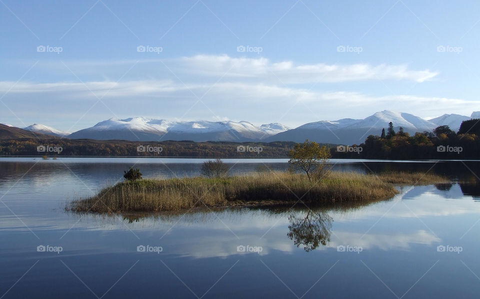 snow mountain lake scotland by tomrobbarber