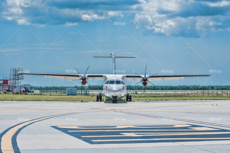 Airplane on airport runway