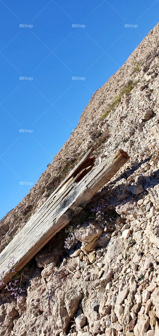 simple wood in the mountaine. 
Who leave it there?