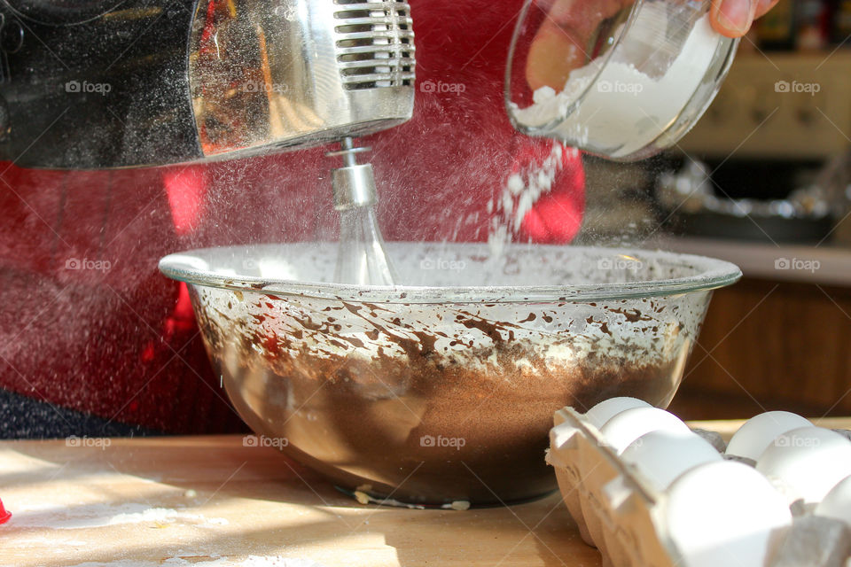 Whisking Flour into Ingredients